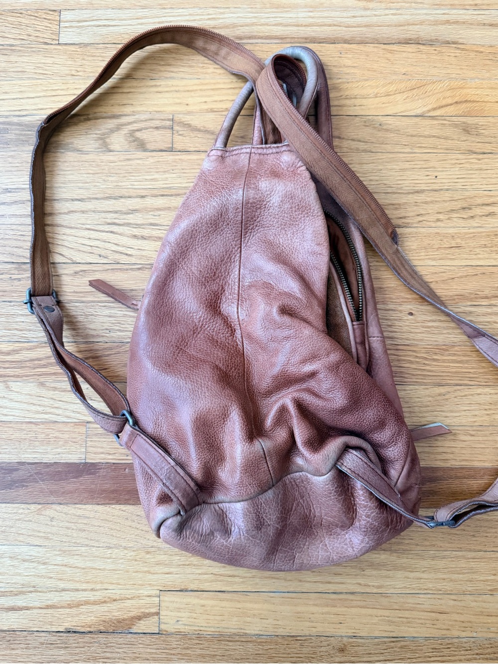 We The Free Rustic Brown Leather Sling Backpack